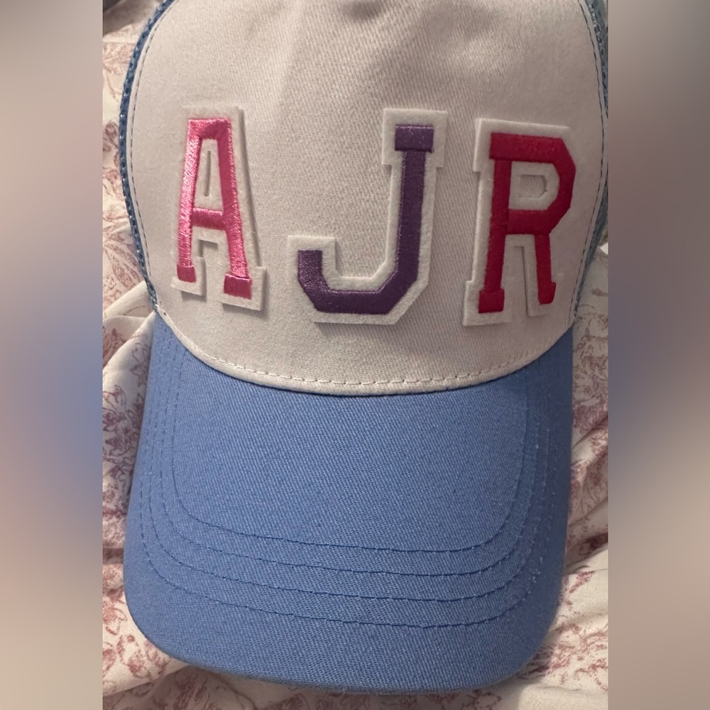 Light Blue and White Trucker Cap with Pink, Purple,Red  Lettering AJR